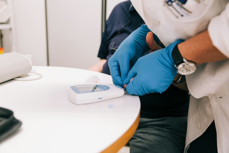 nurse doing diabetes test