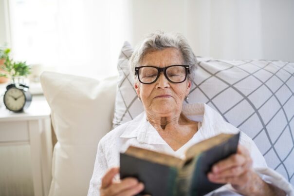 Older woman recovering from wound in her bed